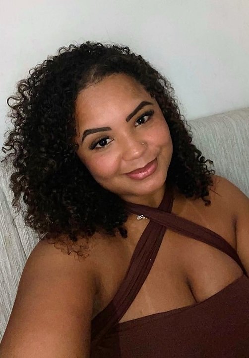 Maya Moraes - mulher negra sorrindo - São Paulo - MClass